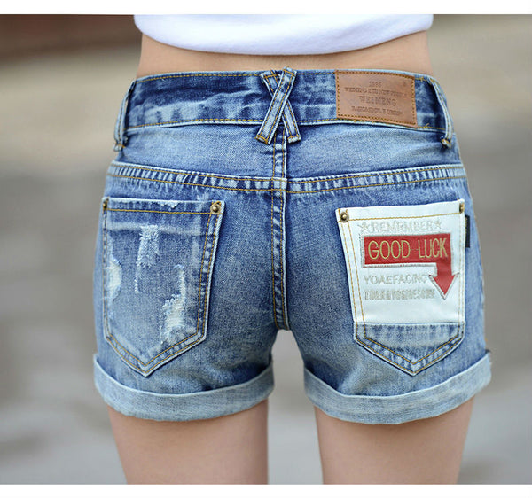 Summer hole denim shorts women Fashion mid elastic waist hemming short jeans.